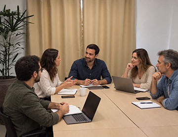 Profissionais em reunião no Eccolo